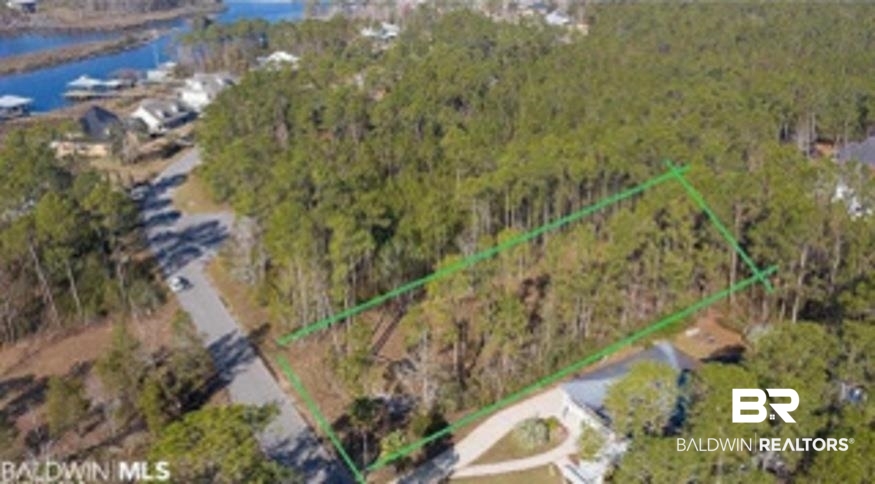 9030 Bay Point Drive Elberta, AL 36530 - Photo 10 of 16 Aerial view of property and surrounding area with property boundaries highlighted and a large body of water