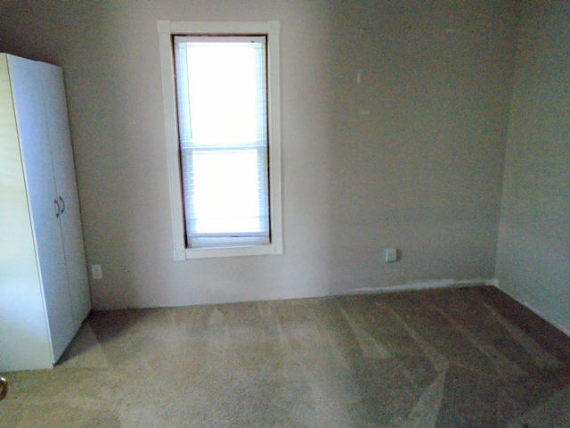 1174 Fisk Road Compton, IL 61318 - Photo 5 of 15 an empty room with a window