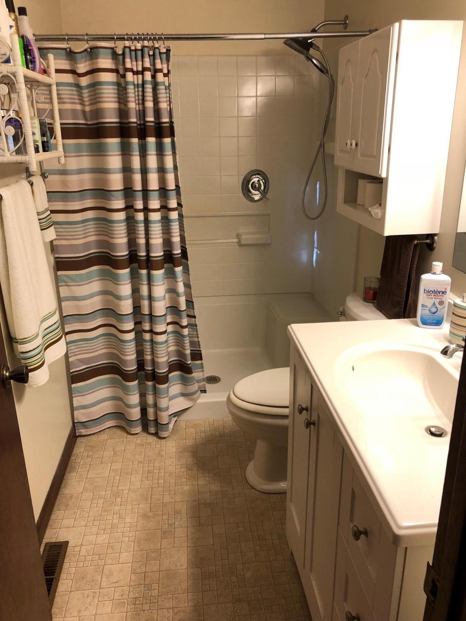 1215 Ridgeway Circle Athens, TN 37303 - Photo 3 of 7 a bathroom with a sink toilet and shower