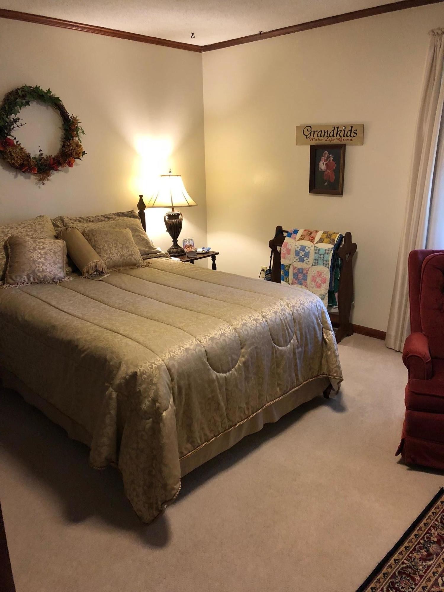 1215 Ridgeway Circle Athens, TN 37303 - Photo 7 of 7 a bedroom with bed and a night stand