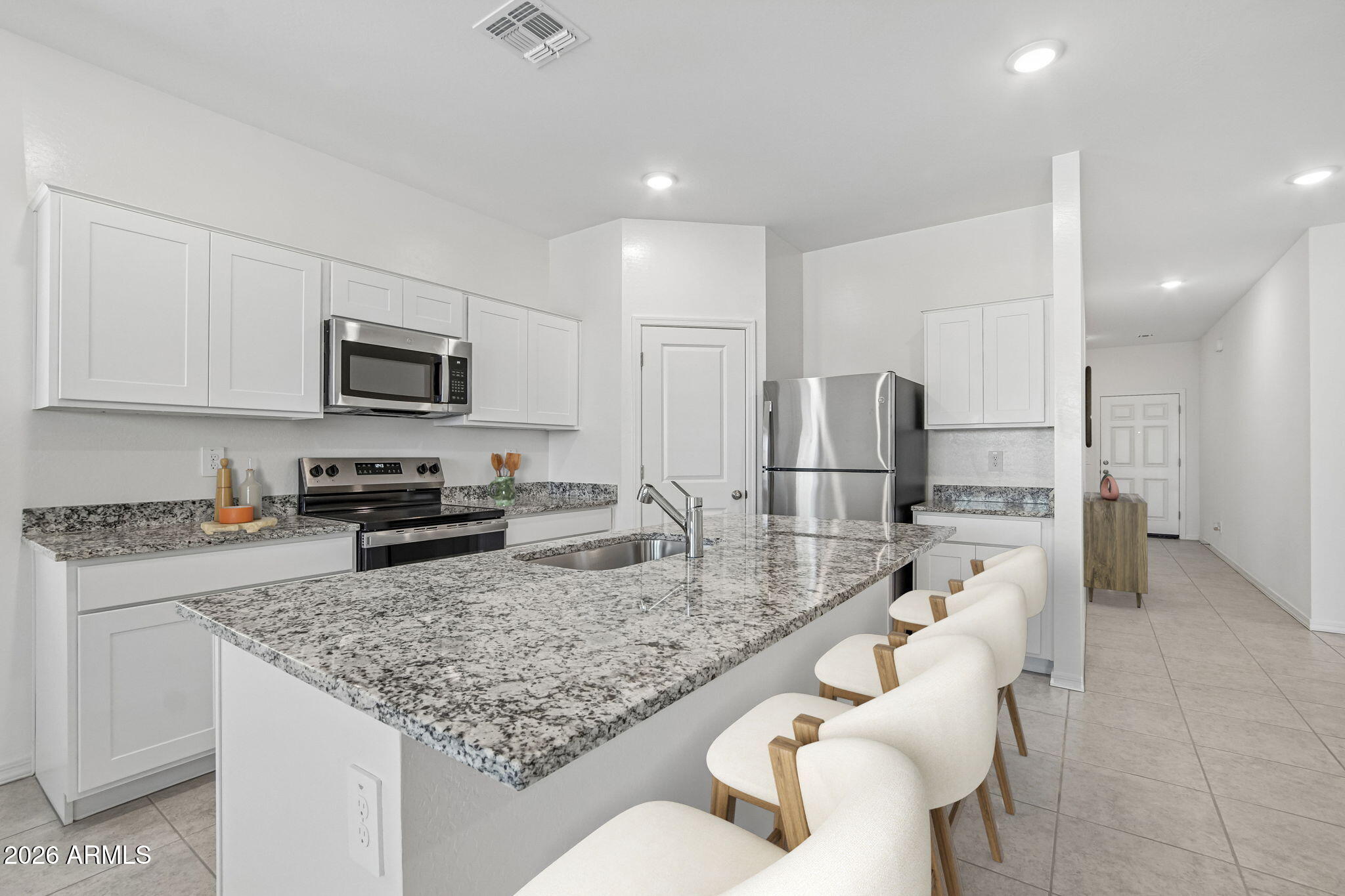 47235 West Old Timer Road Maricopa, AZ 85139 - Photo 7 of 23 SL_Moonbeam_Kitchen_B_Staged
