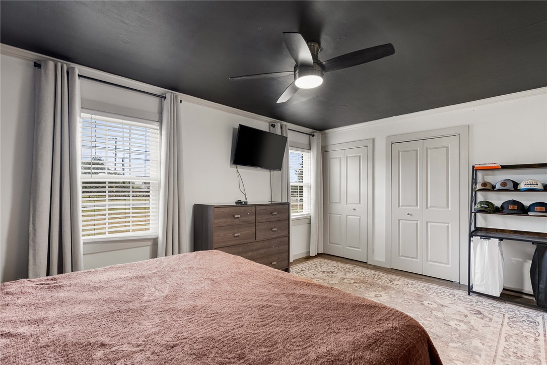 4508 Old Williamston Road Belton, SC 29627 - Photo 16 of 47 The primary bedroom features ample natural light, a ceiling fan, and plenty of storage.