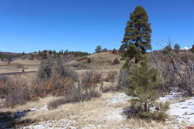 a view of a lake with a mountain