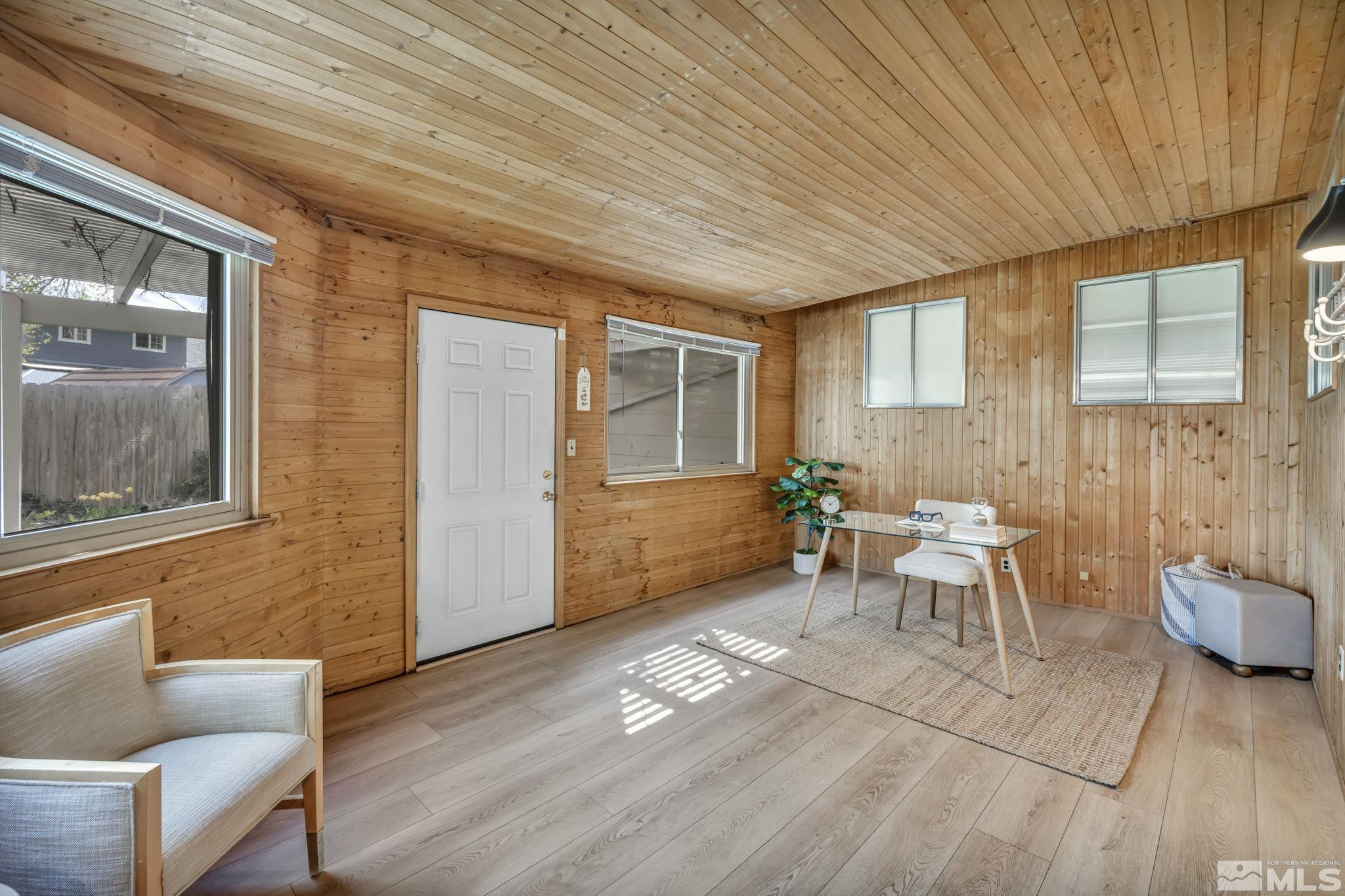 909 Norrie Drive Carson City, NV 89703 - Photo 16 of 39 a living room with furniture and a window