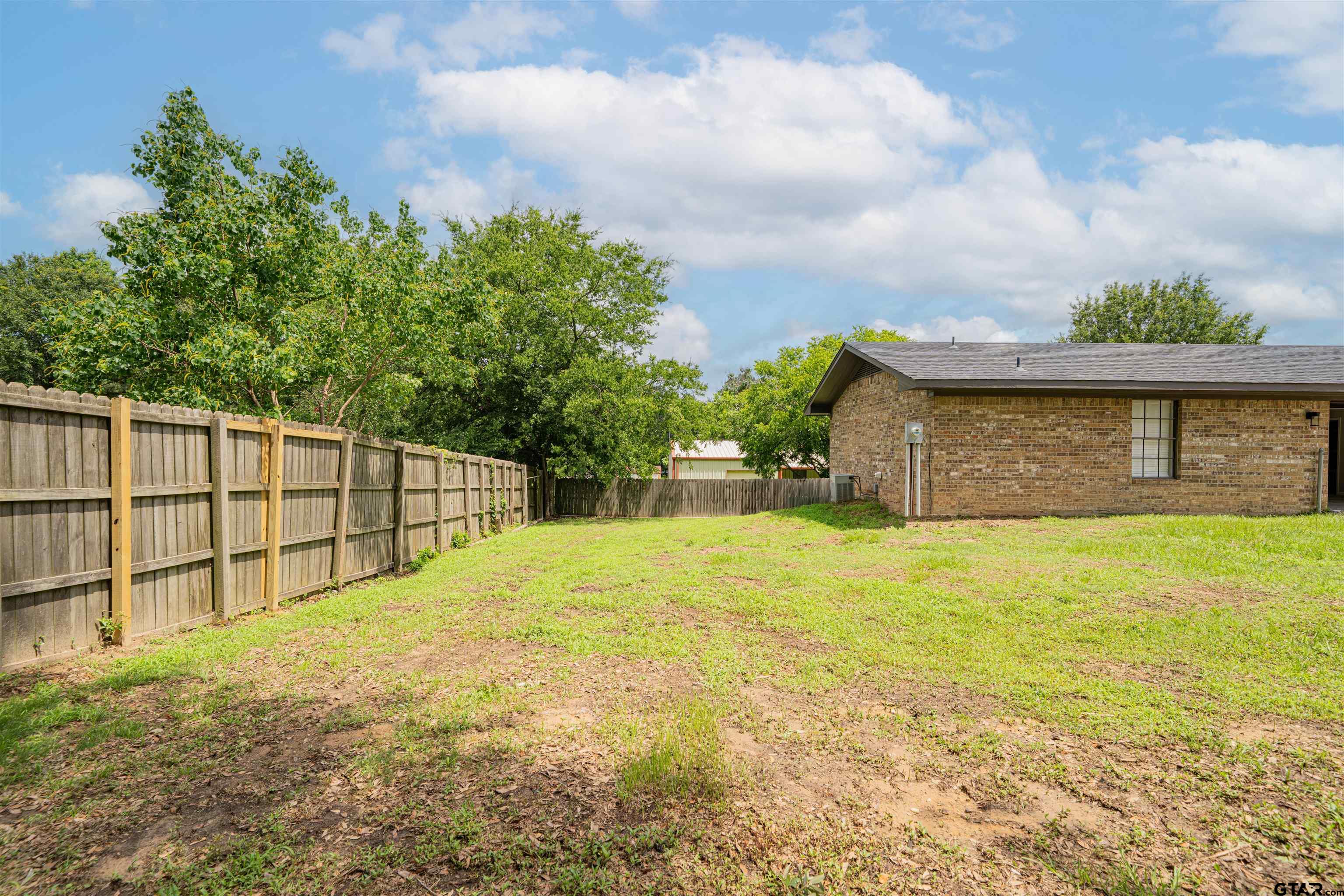 291 Taylor George Road Longview, TX 75605 - Photo 30 of 35 a view of a backyard