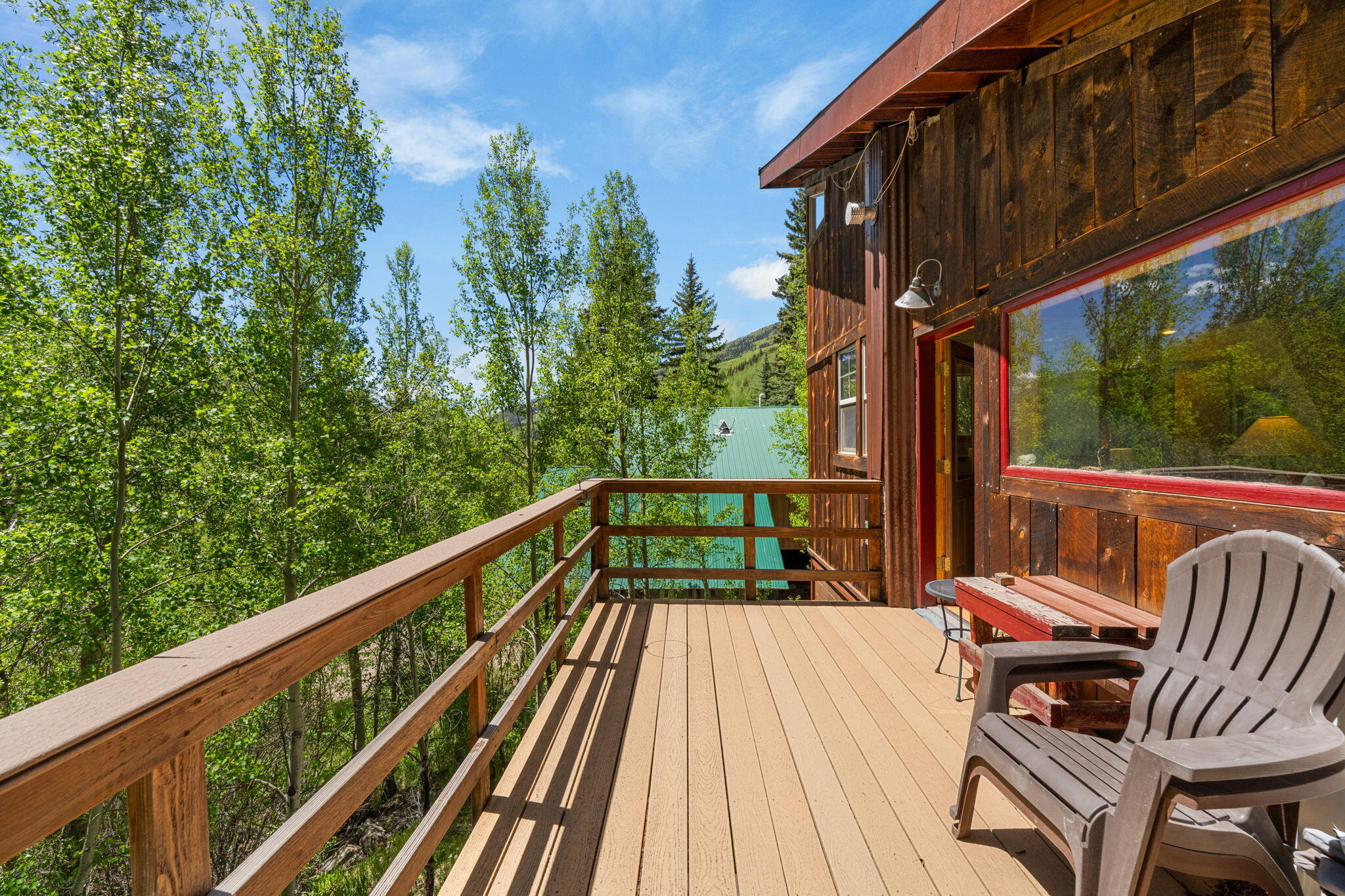 313 North Piedmont Street Rico, CO 81332 - Photo 34 of 43 a view of balcony with wooden floor and outdoor seating