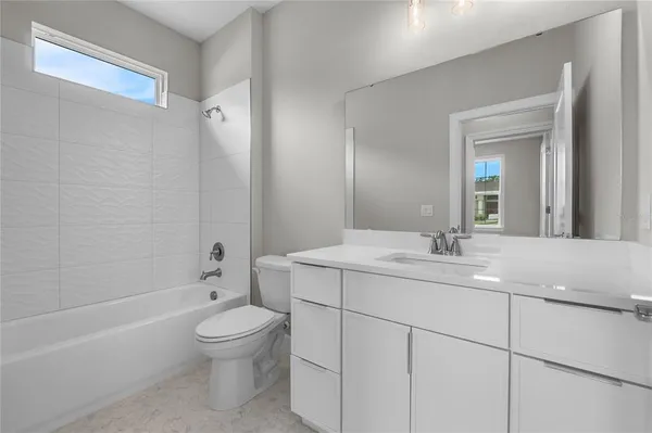 a view of a field with trees