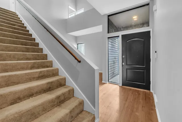 a view of a kitchen with a sink and a stove