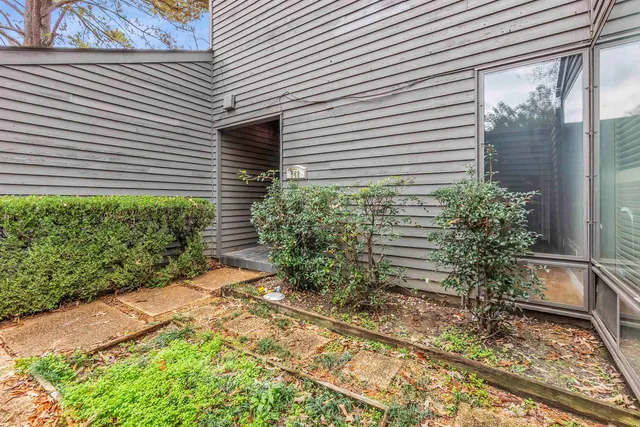 a plant that is in front of a house