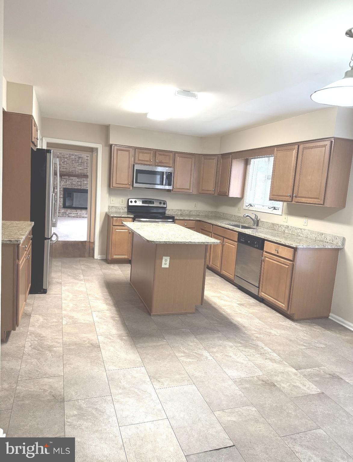 48 Beech Hill Drive Newark, DE 19711 - Photo 3 of 11 a kitchen with a sink a counter top space and appliances