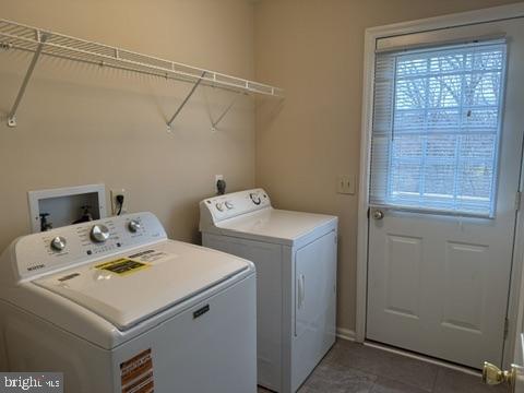 48 Beech Hill Drive Newark, DE 19711 - Photo 6 of 11 a utility room with dryer and washer