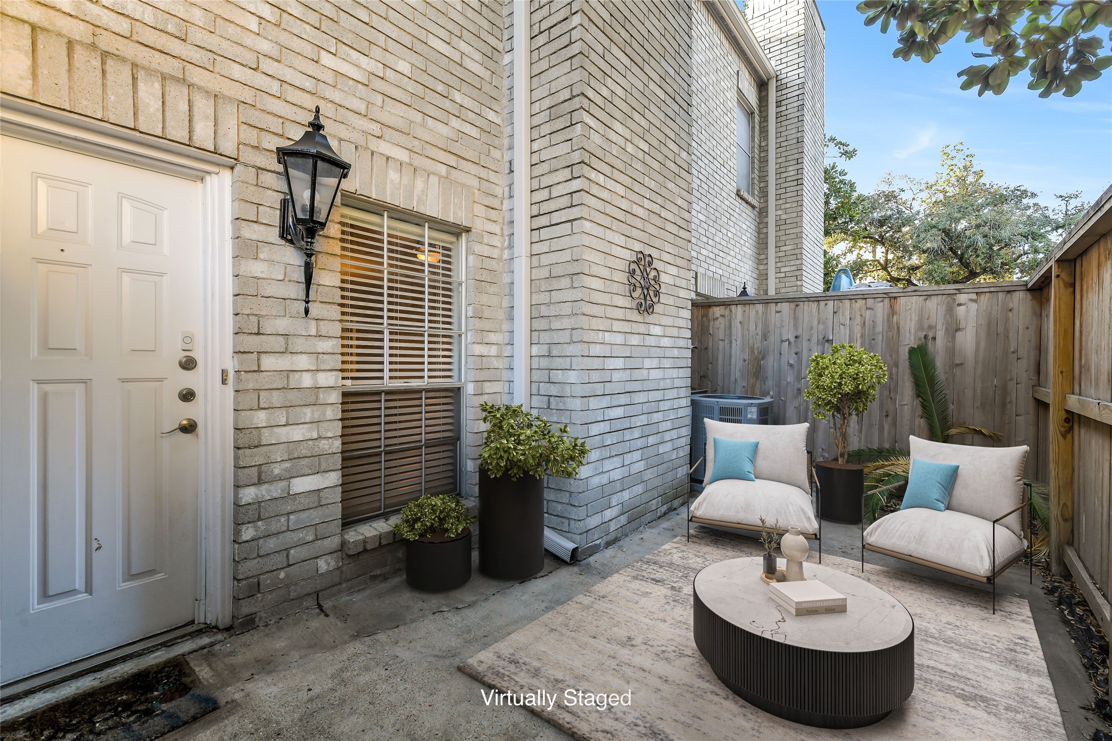 4001 Tanglewilde Street, Unit 1402 Houston, TX 77063 - Photo 4 of 23 Transform this charming outdoor space into your personal oasis—perfect for lounging, gardening, or letting pets enjoy fresh air.