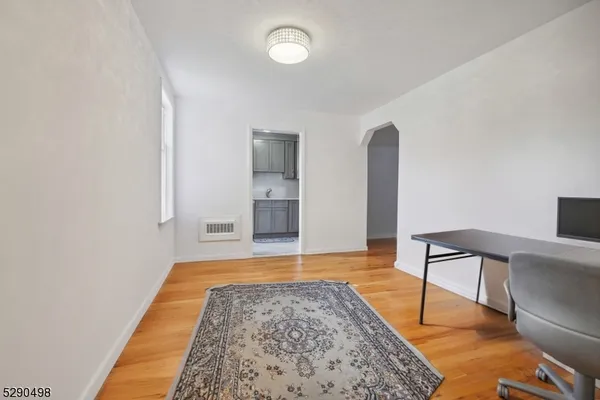 a bedroom with a bed and a table