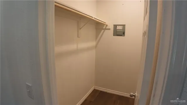 a bathroom with a shower and toilet