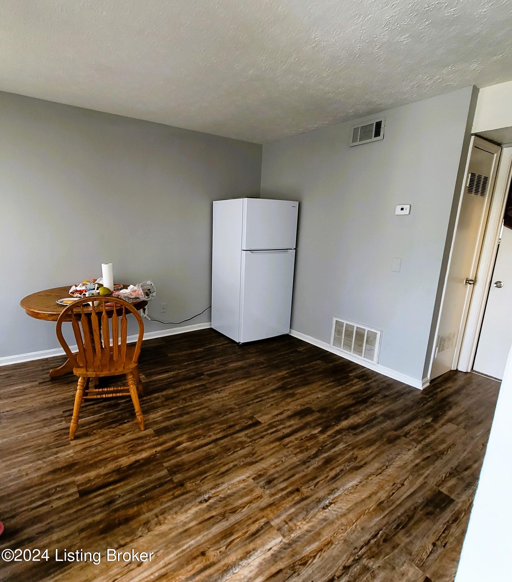 3422 Shagbark Road Louisville, KY 40216 - Photo 8 of 20 2bd 1bath Living room Refrigerator will