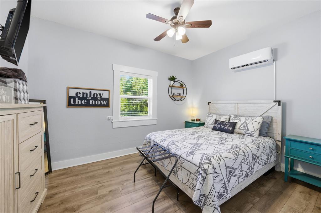 2320 Mistletoe Street Waco, TX 76706 - Photo 17 of 23 a bedroom with a bed and a window