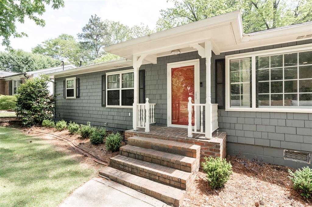 2877 Briarcliff Road Northeast Atlanta, GA 30329 - Photo 1 of 1 Shingle exterior with an eye catching red door.