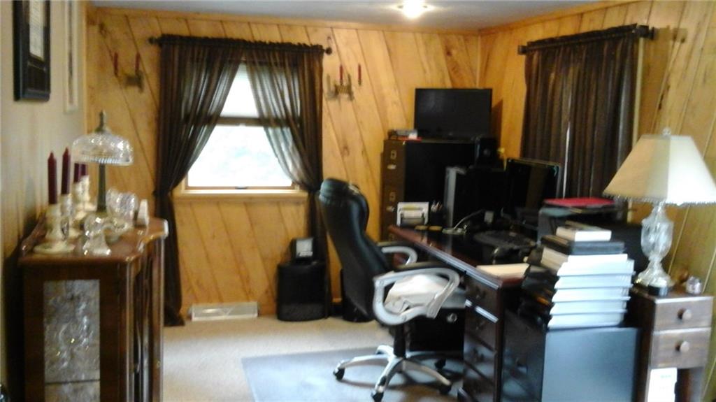 1051 Thompson Run Road Harwick, PA 15049 - Photo 16 of 19 Office/Den with built in shelving and Spotted Maple wood walls. Very rare.