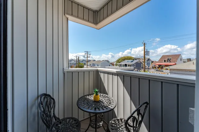 a view of backyard with potted plants