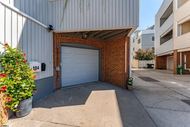 a view of a balcony with wooden floor and fence