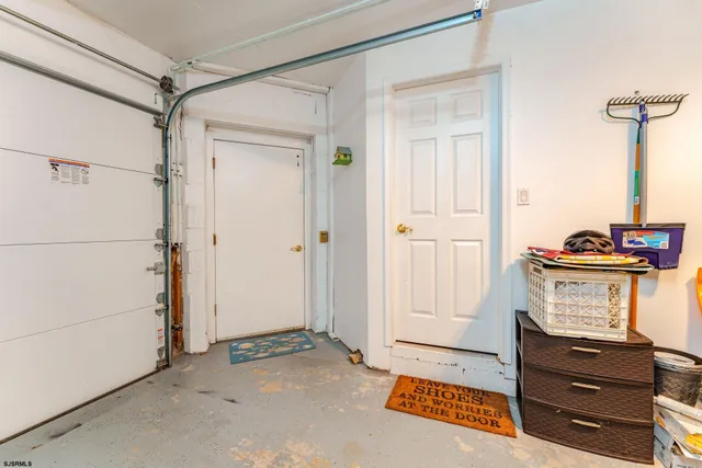 a view of a dining room with furniture window and flowerpot