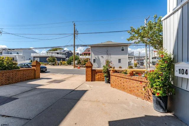 a front view of a building with street view