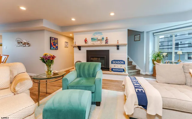 a kitchen with granite countertop a stove top oven microwave and cabinets