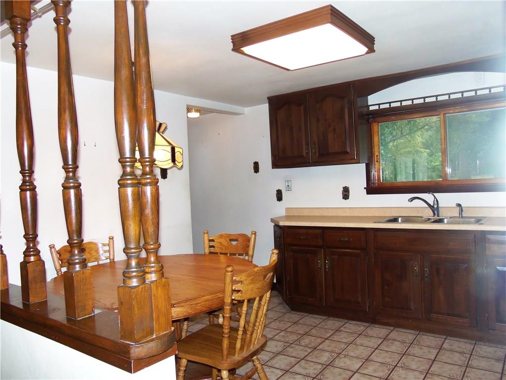 219 Ridge Avenue Freedom, PA 15042 - Photo 3 of 22 Eat-in kitchen with electric stove, refrigerator, micro-wave & ceramic floor