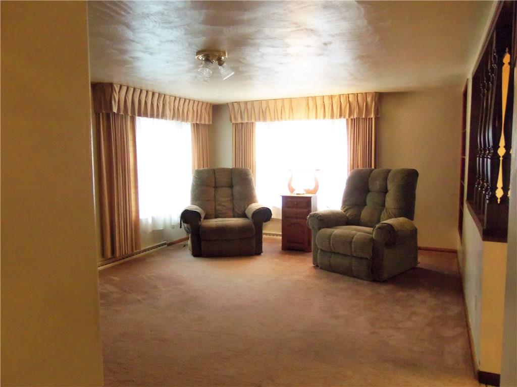 219 Ridge Avenue Freedom, PA 15042 - Photo 5 of 22 Living room - open to kitchen, large widows let in plenty of natural light.