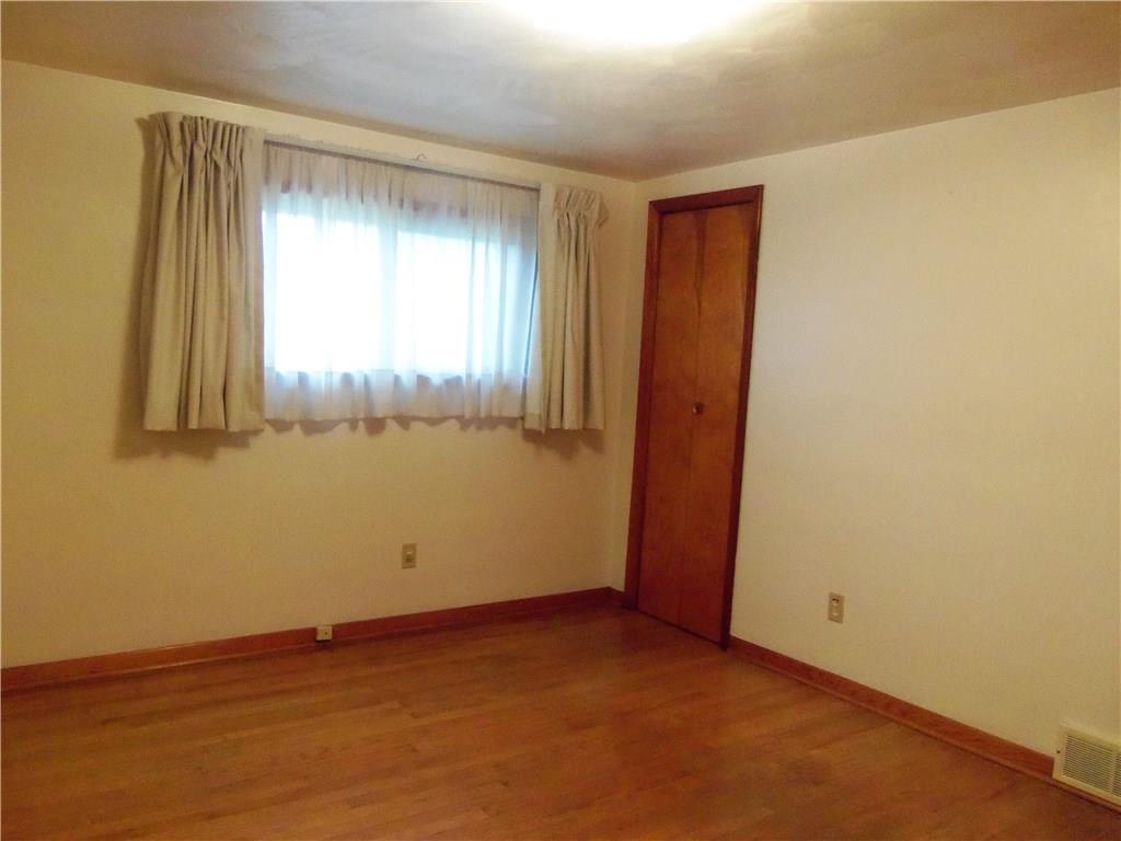 219 Ridge Avenue Freedom, PA 15042 - Photo 7 of 22 Master bedroom with hardwood floor
