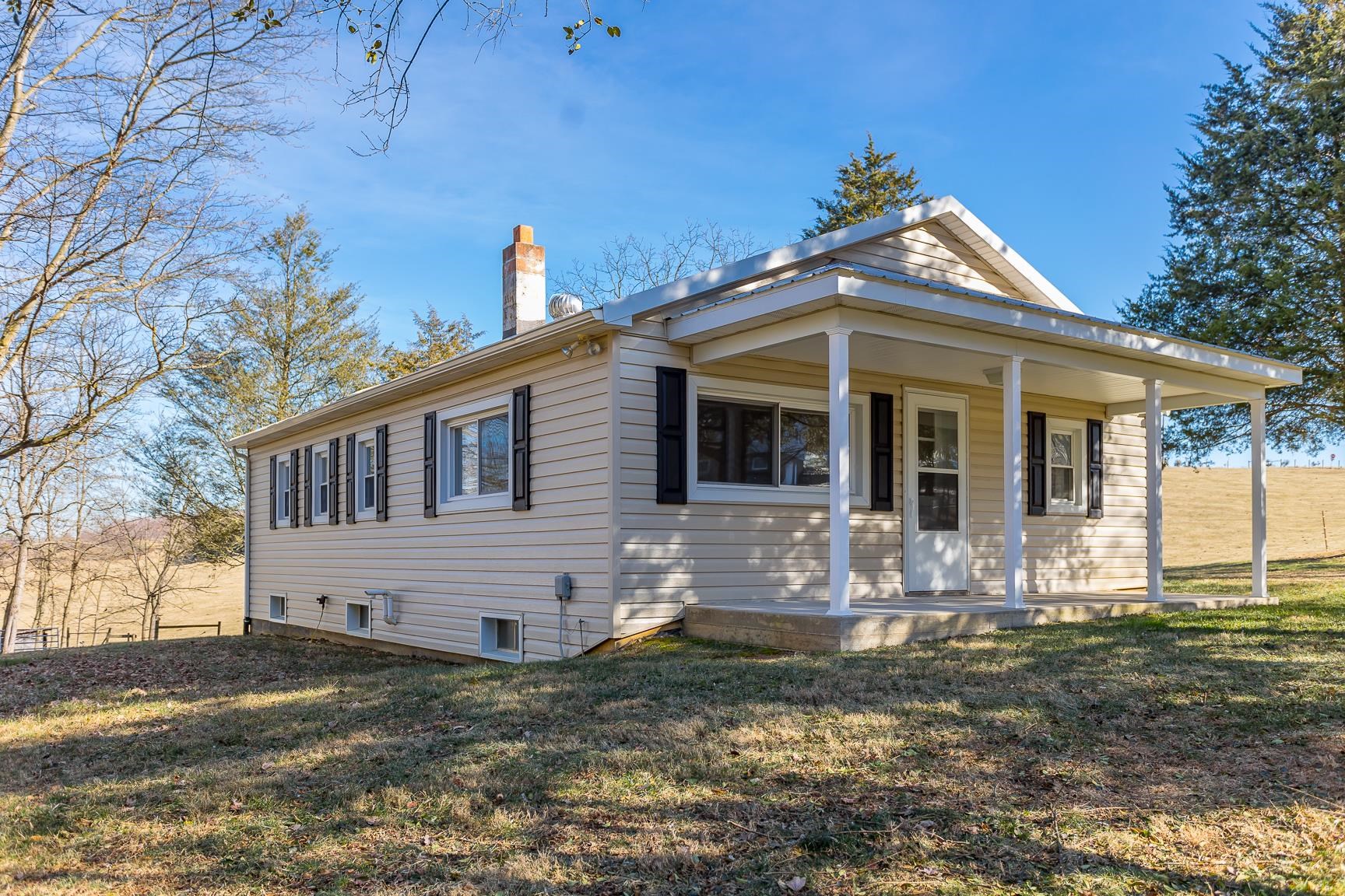 7176 Winestore Road Timberville, VA 22853 - Photo 2 of 45 a front view of a house with yard