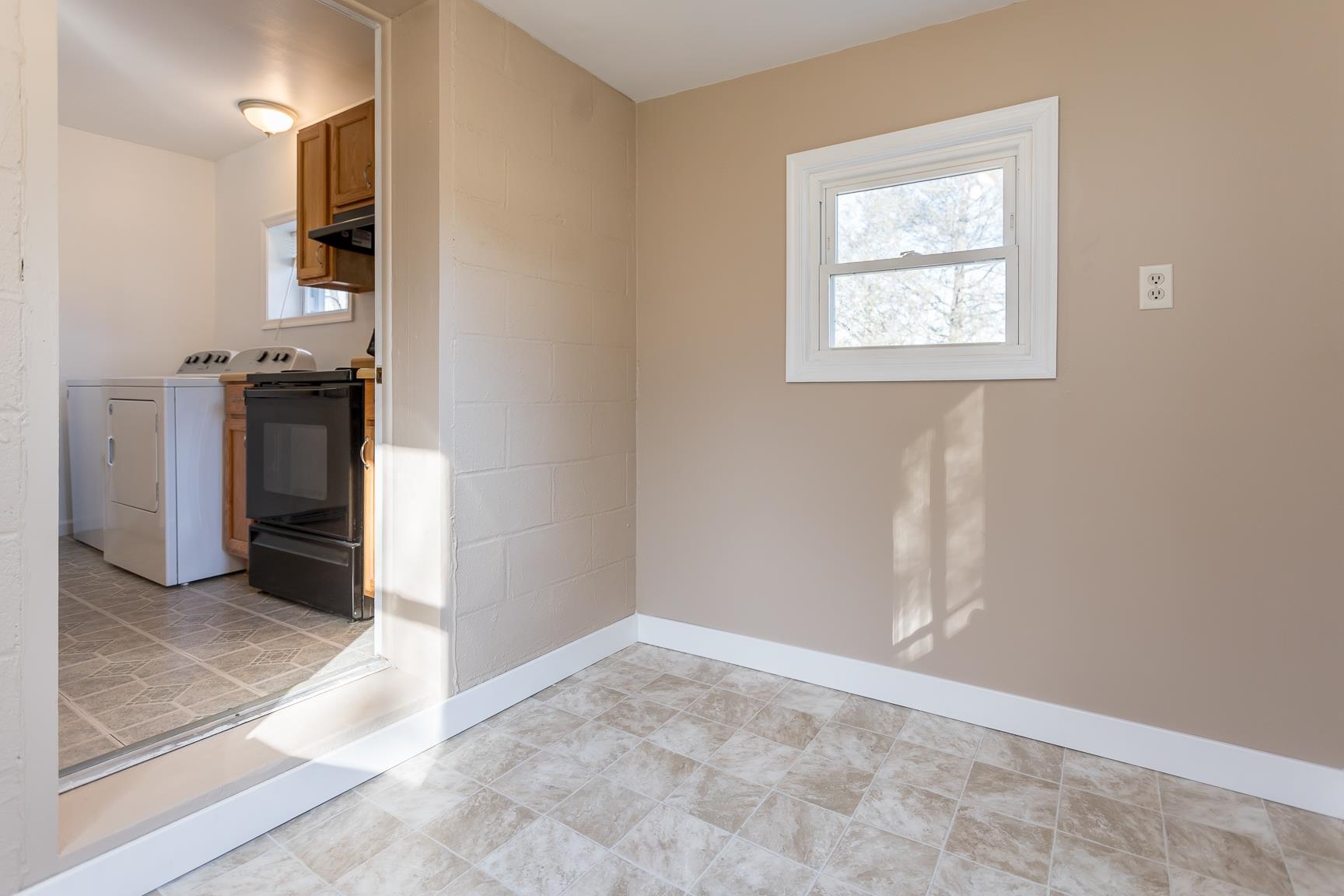 7176 Winestore Road Timberville, VA 22853 - Photo 24 of 45 a view of a hallway with an empty room and a window