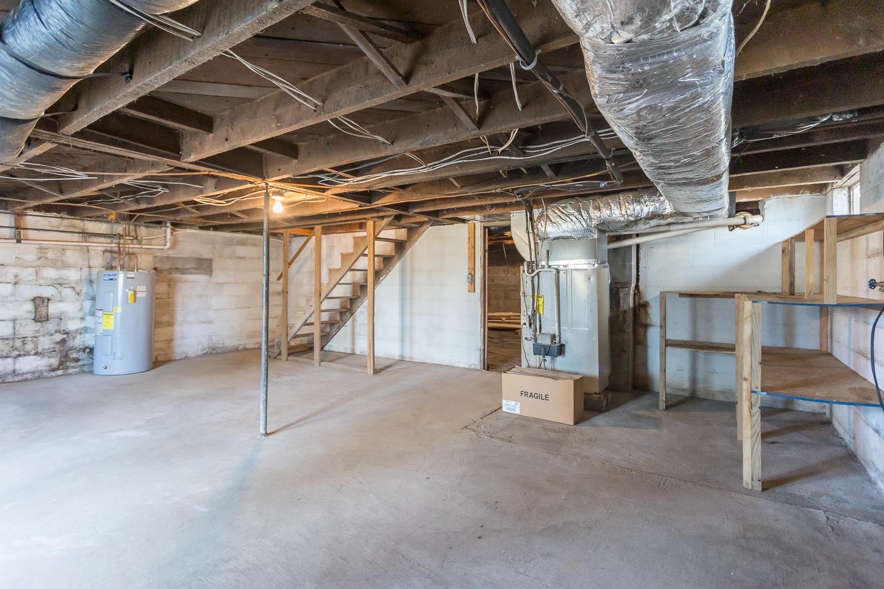 7176 Winestore Road Timberville, VA 22853 - Photo 27 of 45 a view of an empty room with wooden walls