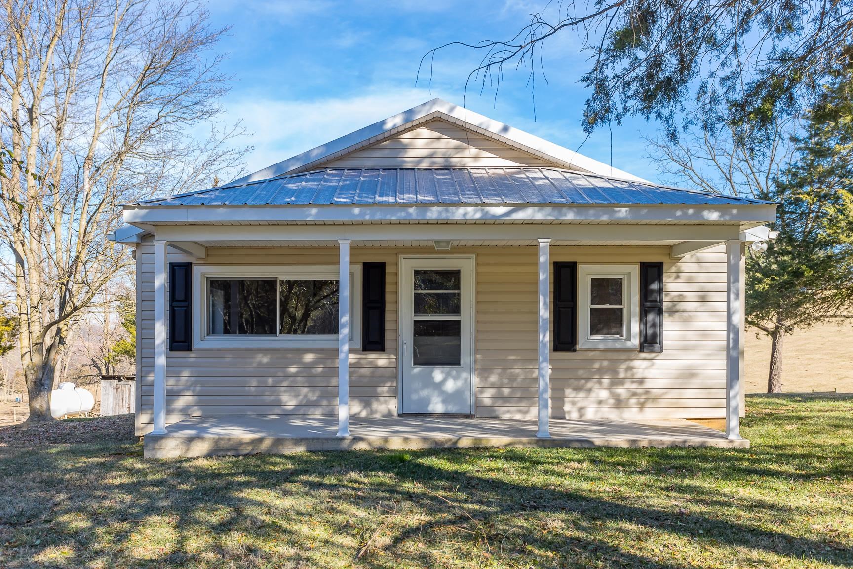 7176 Winestore Road Timberville, VA 22853 - Photo 3 of 45 a front view of a house with a yard