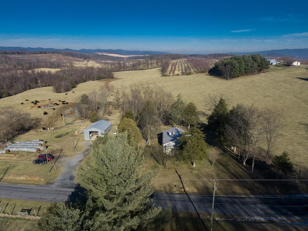 7176 Winestore Road Timberville, VA 22853 - Photo 38 of 45 a view of a lake with a mountain