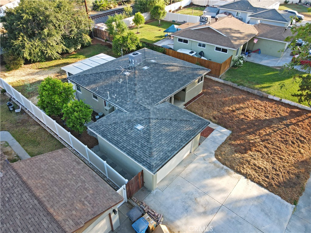 3445 Tipperary Way Riverside, CA 92506 - Photo 24 of 26 an aerial view of a house with a yard