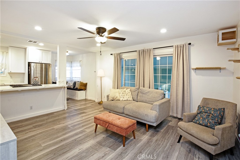 3445 Tipperary Way Riverside, CA 92506 - Photo 4 of 26 a living room with furniture and a large window
