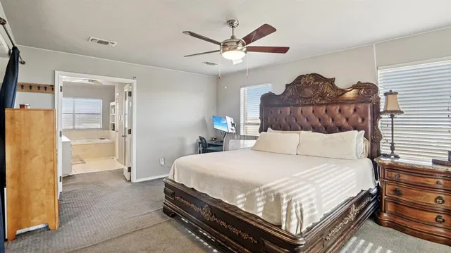 a bedroom with a bed and closet