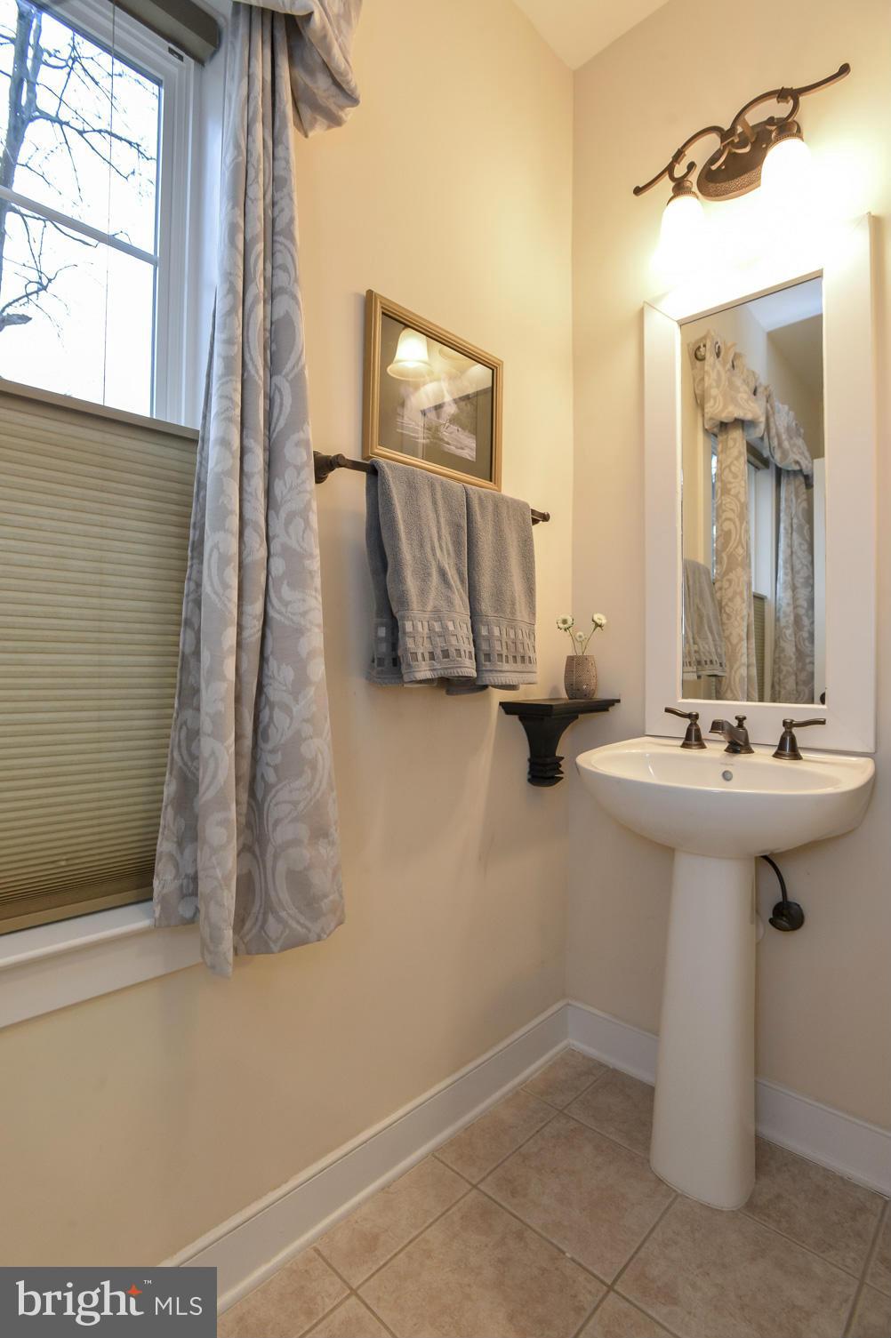 224 Tapawingo Road Southeast Vienna, VA 22180 - Photo 11 of 30 Main Level Half Bath off Mud Room & Kitchen