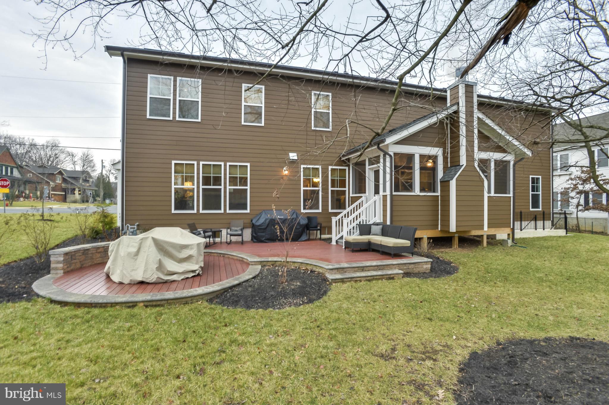 224 Tapawingo Road Southeast Vienna, VA 22180 - Photo 28 of 30 Raised wood patio with screened porch