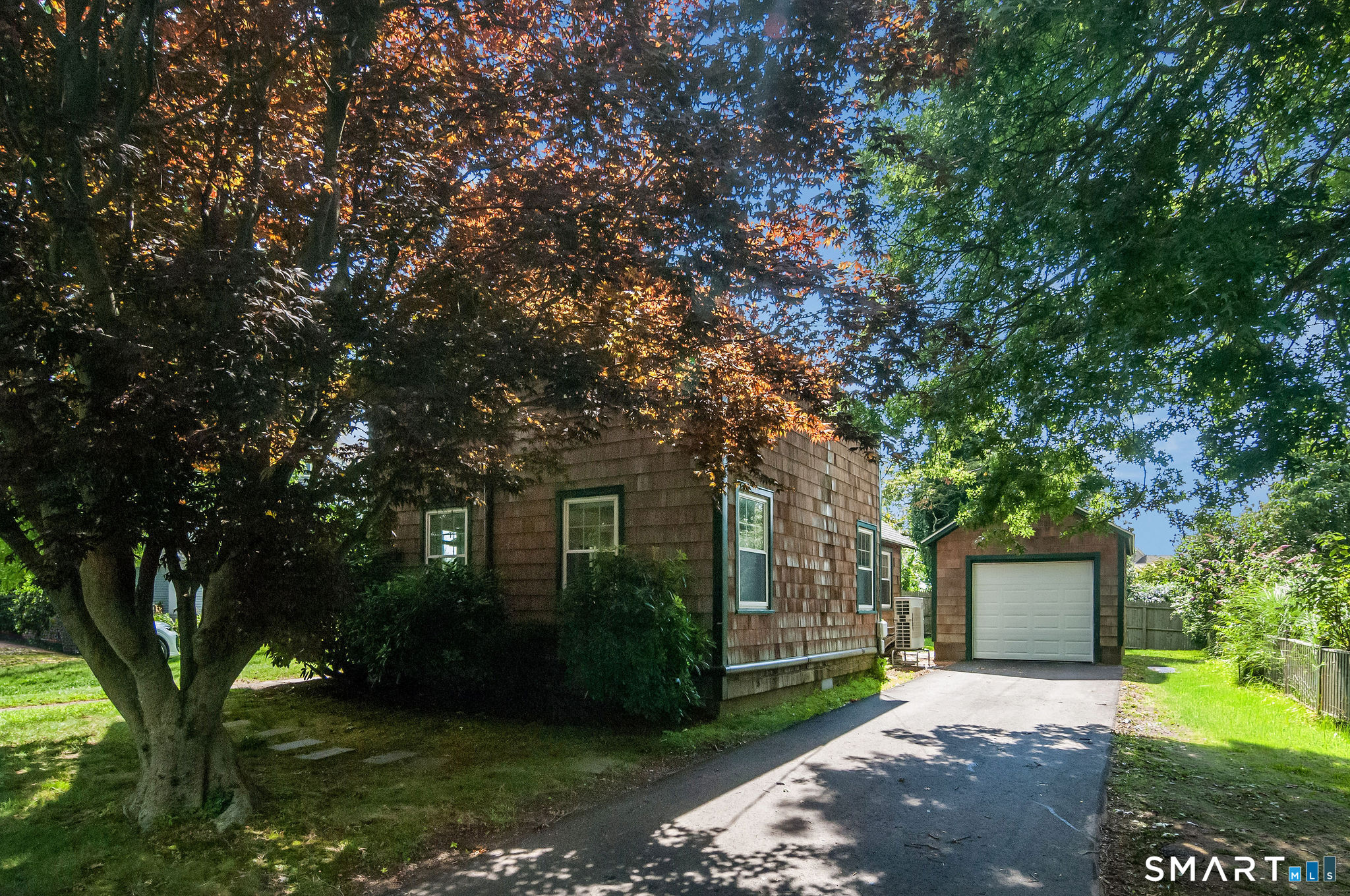 44 Pent Road Madison, CT 06443 - Photo 19 of 24 Detached one car garage, with potting shed in the rear.