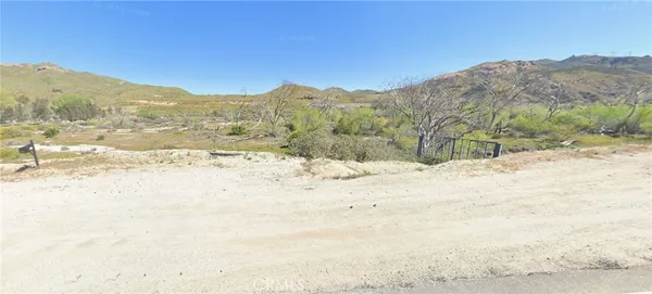 a view of mountain view with mountains in the background