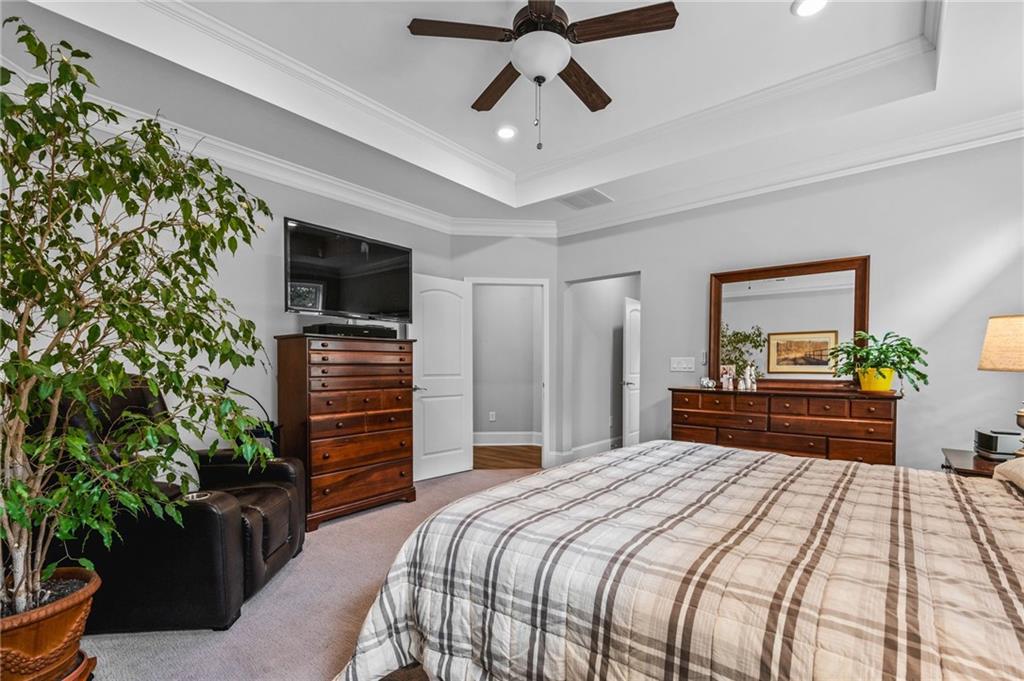 4883 Pleasantry Way Northwest Acworth, GA 30101 - Photo 20 of 46 a bedroom with a bed and a potted plant