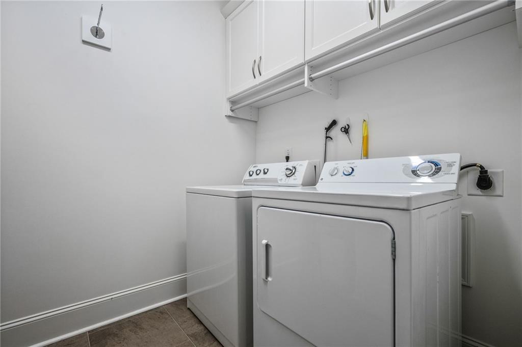 4883 Pleasantry Way Northwest Acworth, GA 30101 - Photo 29 of 46 a utility room with dryer and washer