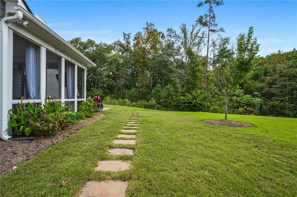 4883 Pleasantry Way Northwest Acworth, GA 30101 - Photo 38 of 46 a swimming pool with lots of tress in front of it