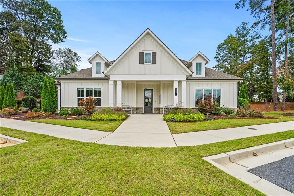 4883 Pleasantry Way Northwest Acworth, GA 30101 - Photo 41 of 46 a front view of a house with a yard and garage