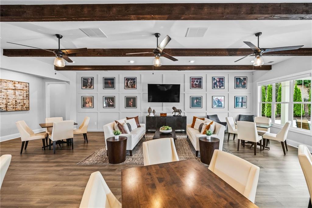 4883 Pleasantry Way Northwest Acworth, GA 30101 - Photo 43 of 46 a living room with lots of furniture and a flat screen tv