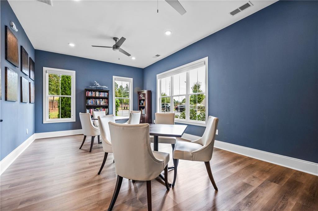 4883 Pleasantry Way Northwest Acworth, GA 30101 - Photo 44 of 46 a dining room with furniture window wooden floor
