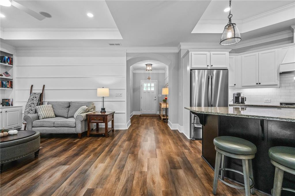 4883 Pleasantry Way Northwest Acworth, GA 30101 - Photo 10 of 46 a living room with furniture and a wooden floor