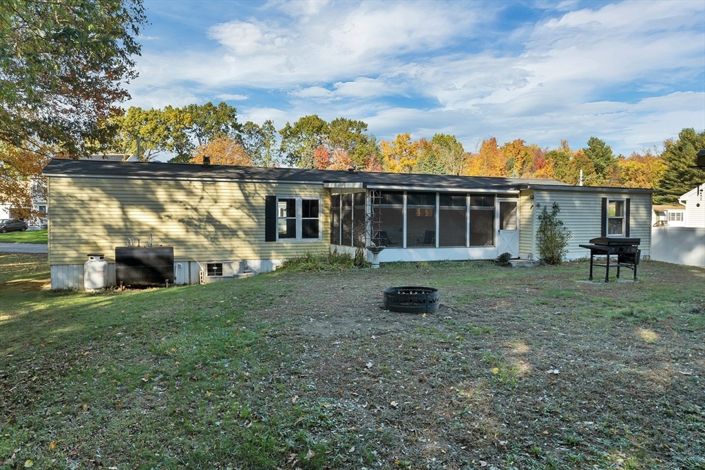28 Brooks Road, Unit 28 Seabrook, NH 03874 - Photo 25 of 34 a view of a house with a yard